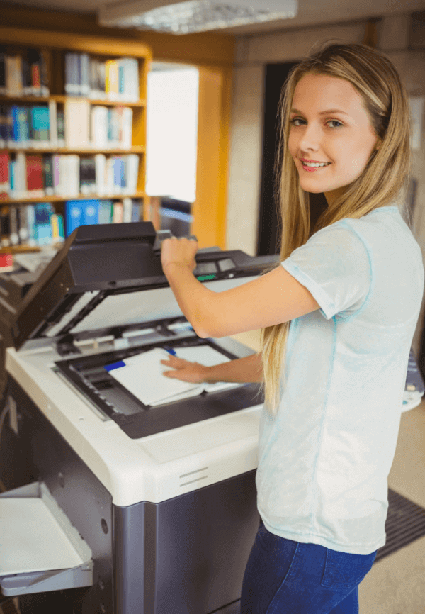 Blonde girl using used copiers